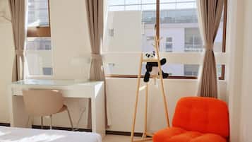 Appartement Familial, vue ville | Rideaux occultants, fer et planche à repasser, Wi-Fi gratuit