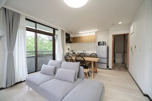 Appartement Familial, balcon, vue parc | Coin séjour