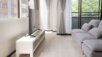 Family Apartment, Balcony, Park View | Living area