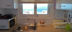 Fridge, microwave, oven, stovetop - Studio Apartment with Sea View and 2 Balconies (Kato Loutro)