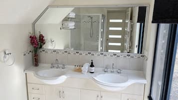 Hair dryer, towels, soap, shampoo