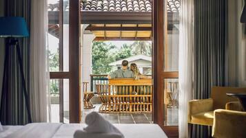 Deluxe Double Room, Pool View | Blackout curtains, free WiFi