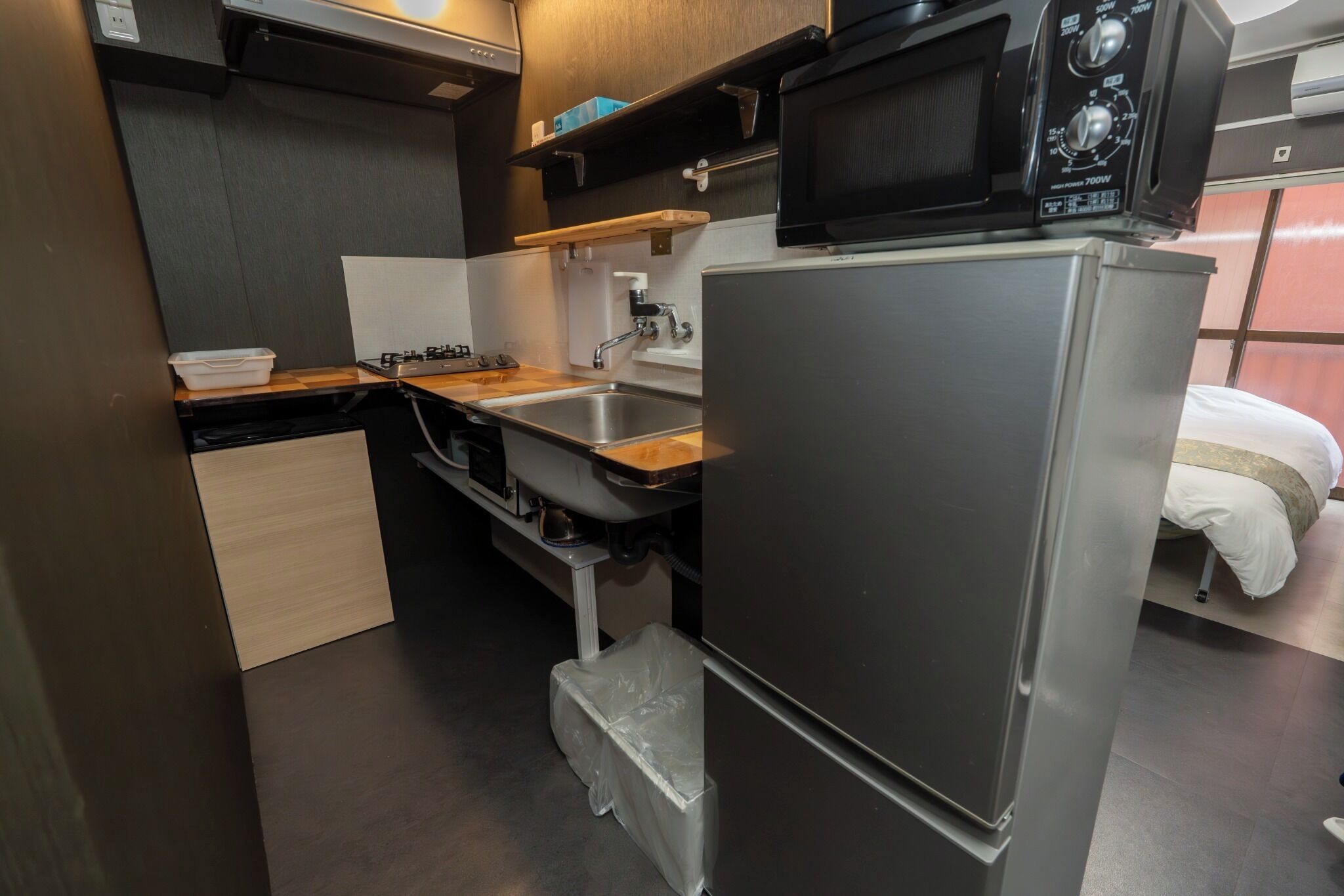 Fridge, microwave, stovetop, cookware/dishes/utensils