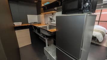 Fridge, microwave, stovetop, cookware/dishes/utensils