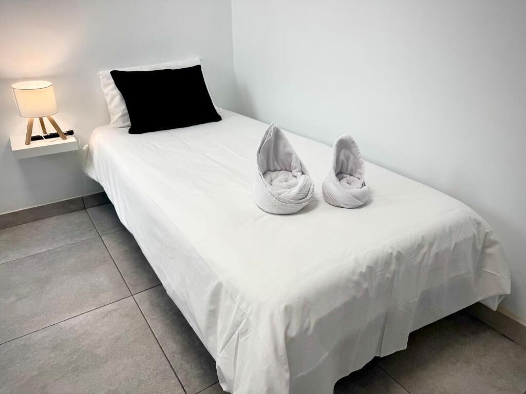 Blackout drapes, iron/ironing board, free WiFi, bed sheets