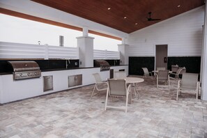 Outdoor dining - Welcome to Easy Breezy.  Luxury Coastal Getaway, Minutes From Two Beaches. (Gulf Breeze)