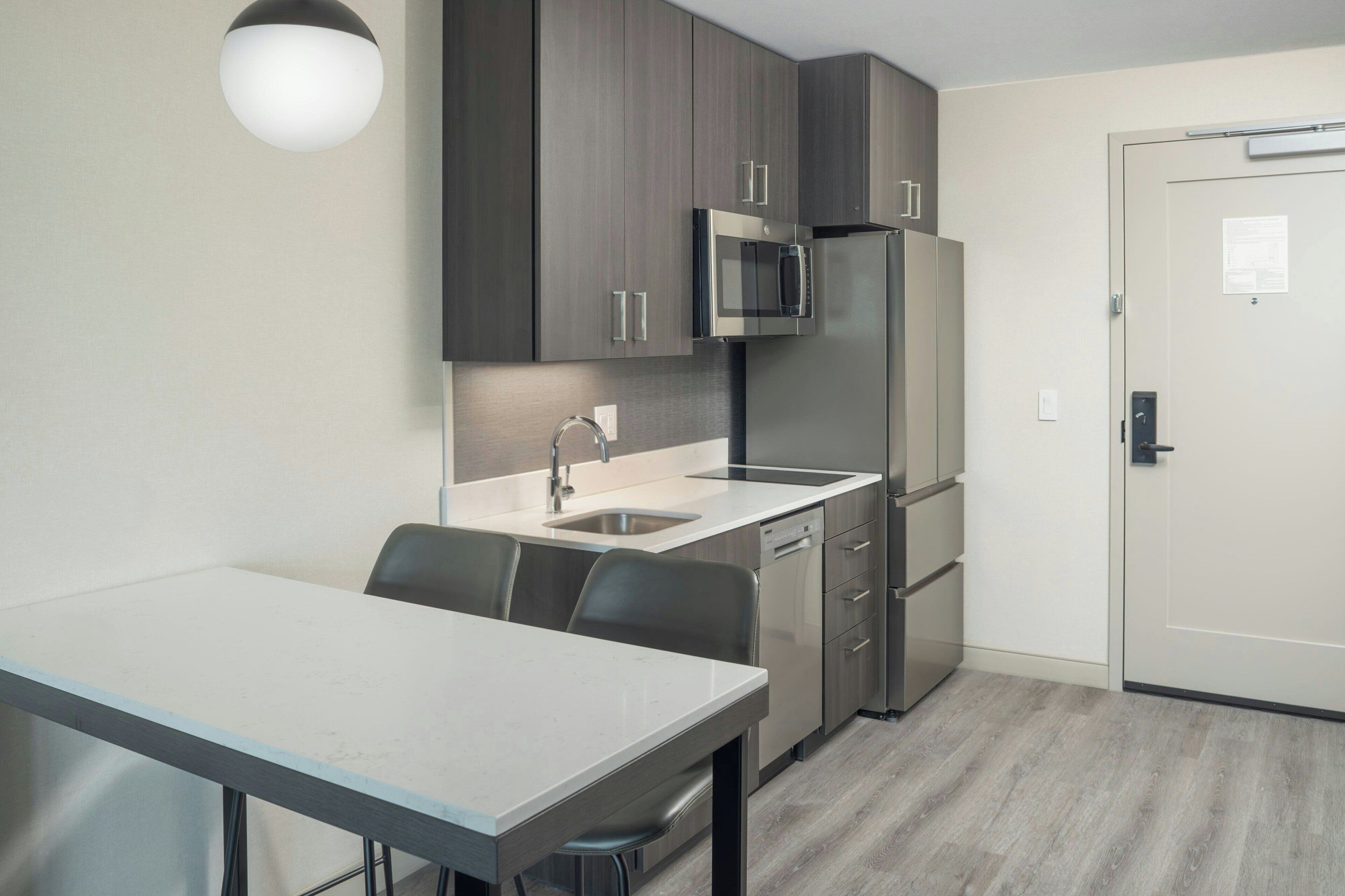 Full-size fridge, microwave, stovetop, dishwasher