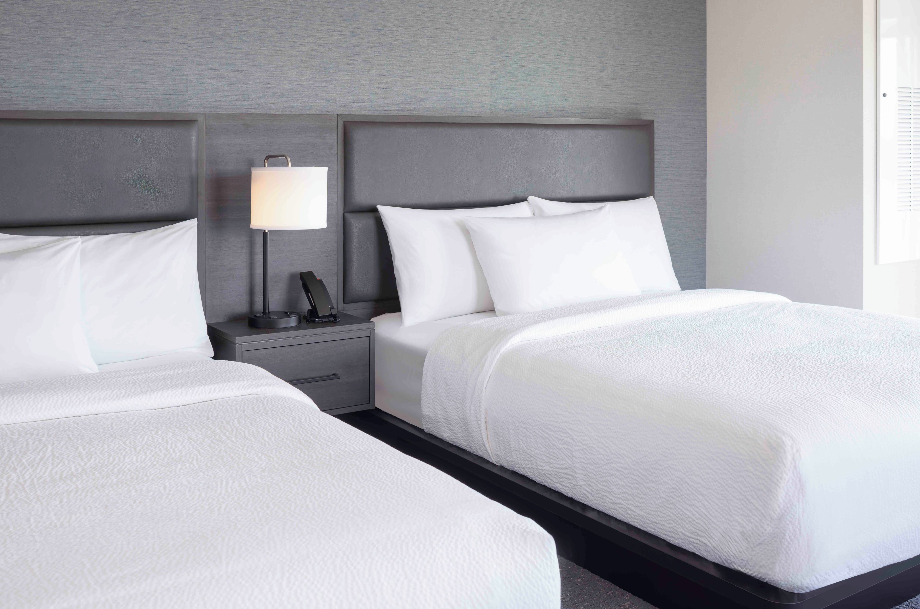 Studio Suite, 2 Queen Beds (Mobility Accessible, Roll-In Shower) | In-room safe, desk, laptop workspace, blackout drapes