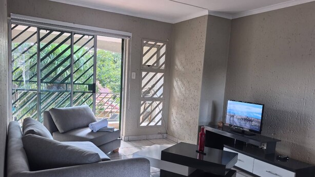 Apartemen, 2 kamar tidur, patio | Ruang keluarga