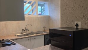 Apartemen, 2 kamar tidur, patio | Dapur pribadi