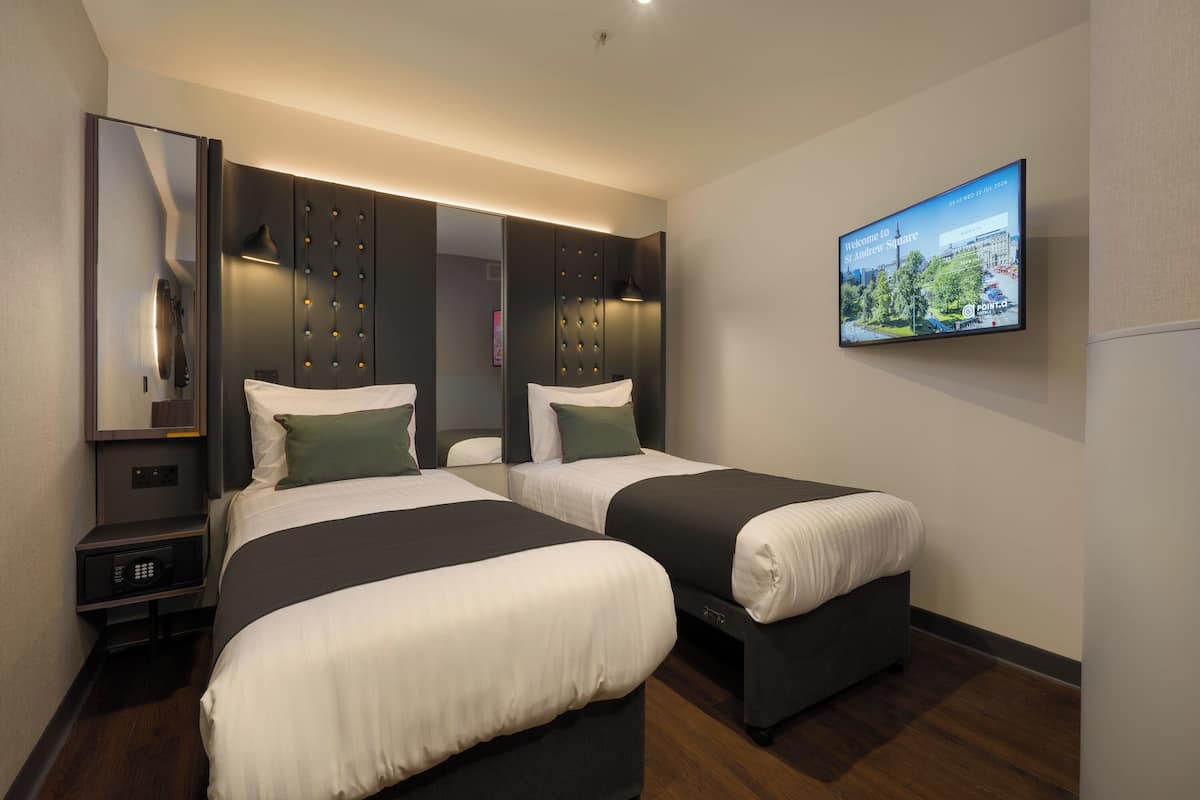 Cosy Twin without Window | Pillow-top beds, desk, laptop workspace, bed sheets