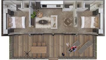 Un plan d’aménagement de chambre d’hôtel comprenant un lit, un coin salon et un balcon avec vue.