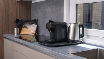 Fridge, microwave, dishwasher, coffee/tea maker