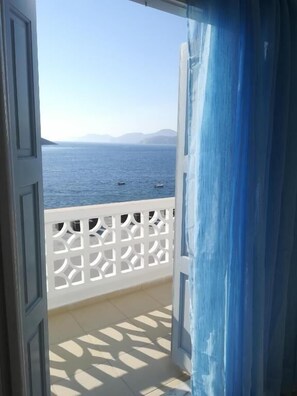 Quarto casal clássico, sacada, vista para o mar | Parte interna