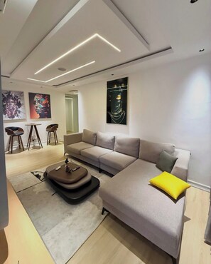 Deluxe Apartment, Balcony, City View | Living area - EIO SHORTLET (Abuja)