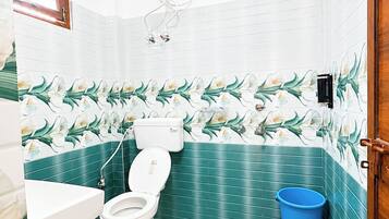 Shower, rainfall showerhead, slippers, towels
