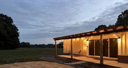 Charming Container Home with Hot Tub near Sardis Lake, Perfect for a Romantic Glamping Getaway