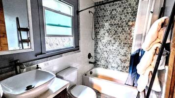 Hair dryer, towels, soap, shampoo