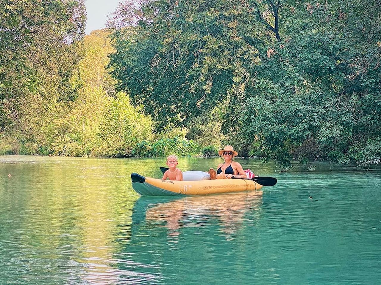 A river scene with a kayak.