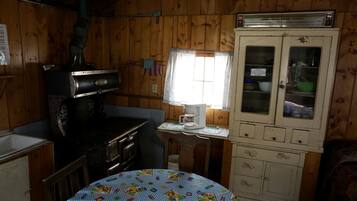 Coffee/tea maker, fridge, stovetop, toaster