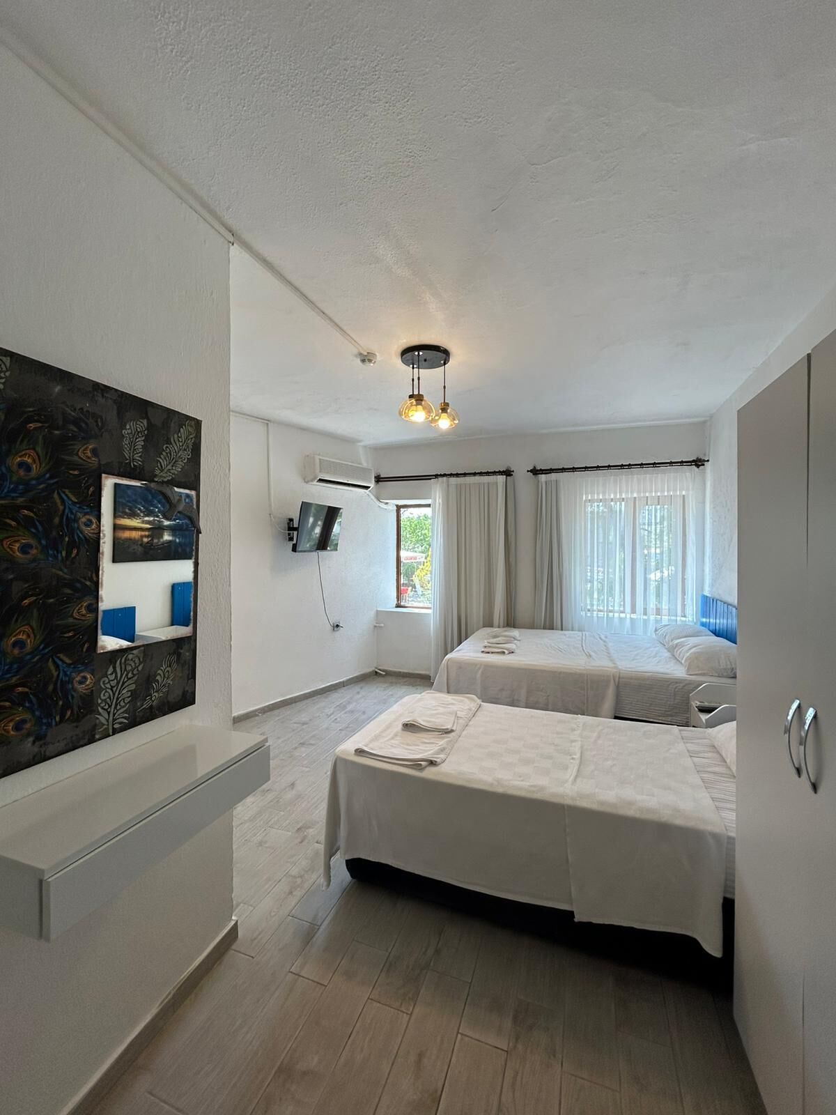 Comfort-Dreibettzimmer, Gartenblick | Kostenloses WLAN