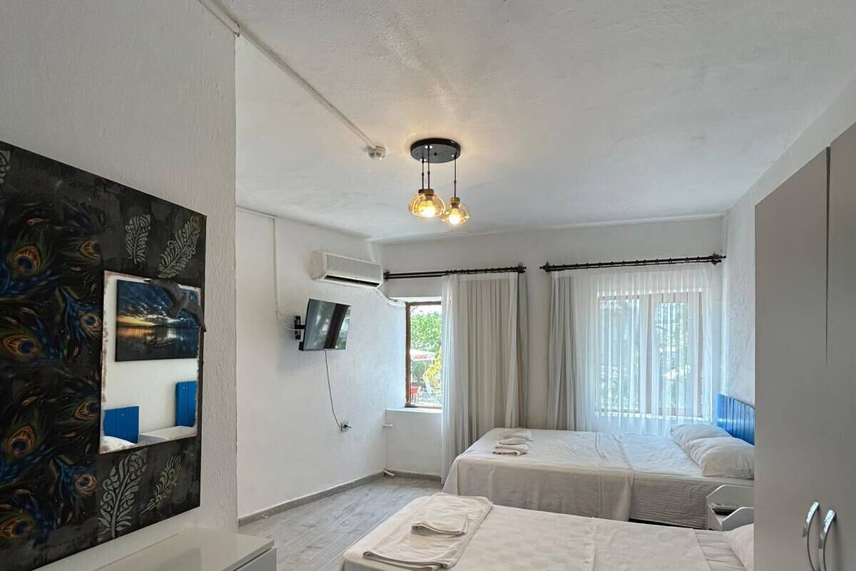 Comfort-Dreibettzimmer, Gartenblick | Kostenloses WLAN