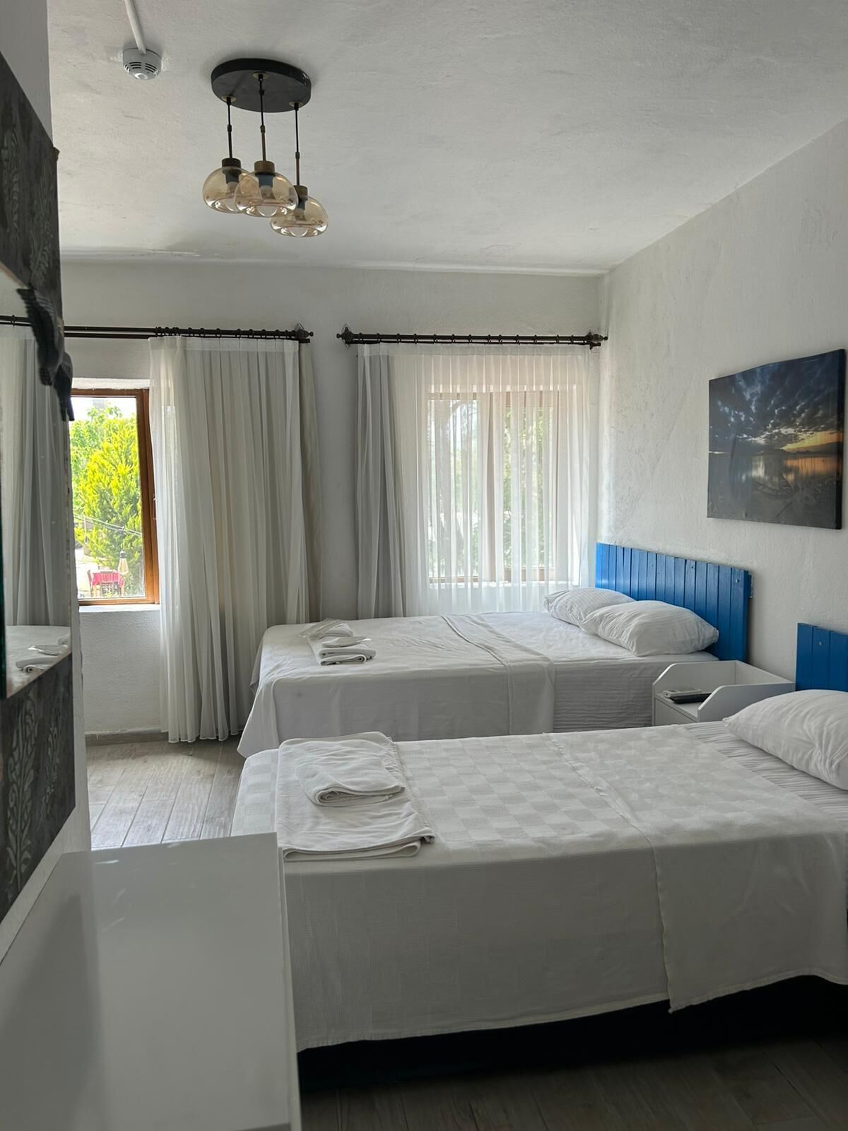 Comfort Triple Room, Garden View | Individually decorated, free WiFi, bed sheets