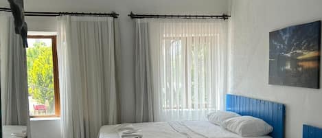 Comfort-Dreibettzimmer, Gartenblick