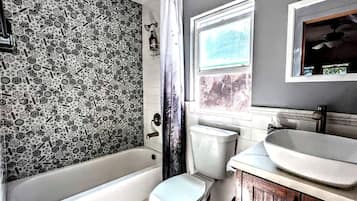 Hair dryer, soap, shampoo, toilet paper