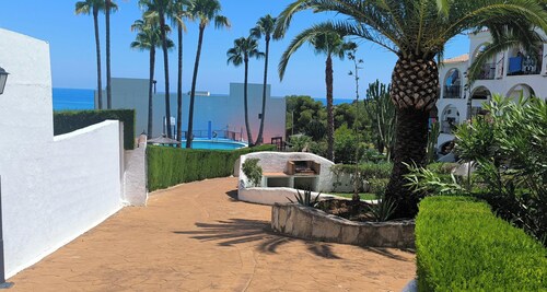 Apartment 'Residencial Calas De Peñíscola' with Sea Views, Wi-Fi & Air Conditioning