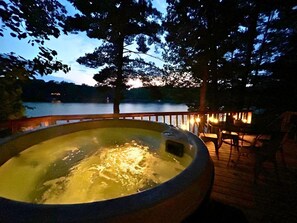 Outdoor spa tub - Charming Lakefront Cabin with Hot Tub and Beach Access near Traverse City, Michigan (Traverse City)