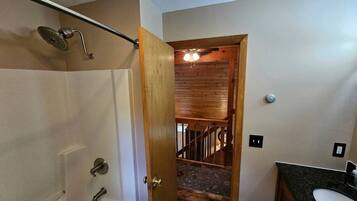 Jetted tub, hair dryer, towels, toilet paper