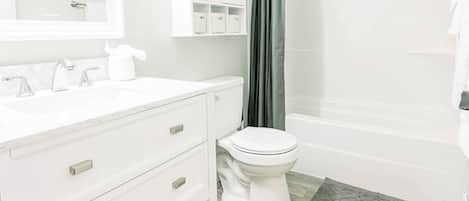 Jetted tub, hair dryer, towels, soap