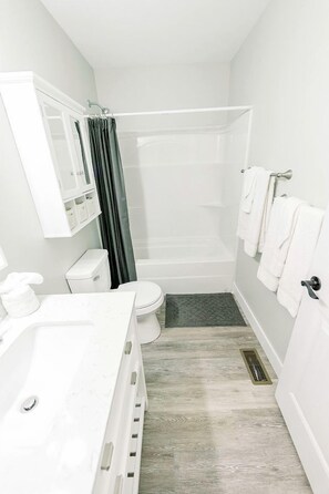 Jetted tub, hair dryer, towels, soap