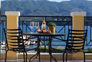 Deluxe Apartment, Sea View | Outdoor dining - AEGEAN VILLAS (Kiani Akti)