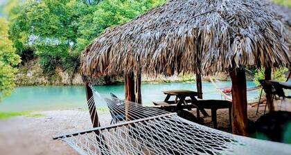 Unplug and Reconnect with Nature in this Lovely Safari Tent Rental on San Marcos River, Texas