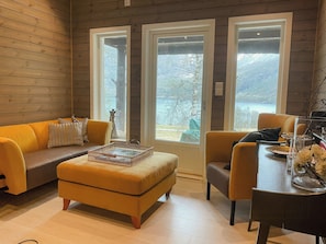 TV, fireplace - Cozy modern cabin in West Norway with view (Ålfoten)
