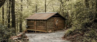 Unique Barnwood Cabin Retreat with Fire Pit and Outdoor Adventure in Zirconia, North Carolina