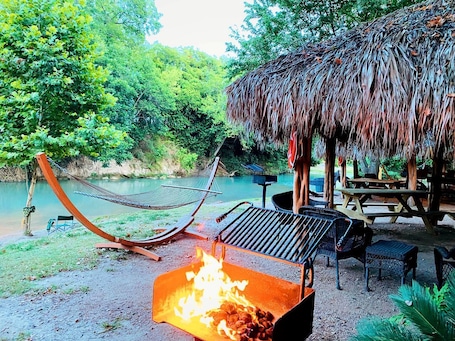 Property grounds. Adventurous Glamping Retreat in a Safari Tent by the San Marcos River near Kingsbury, Texas - Perfect for Water Sports Fans