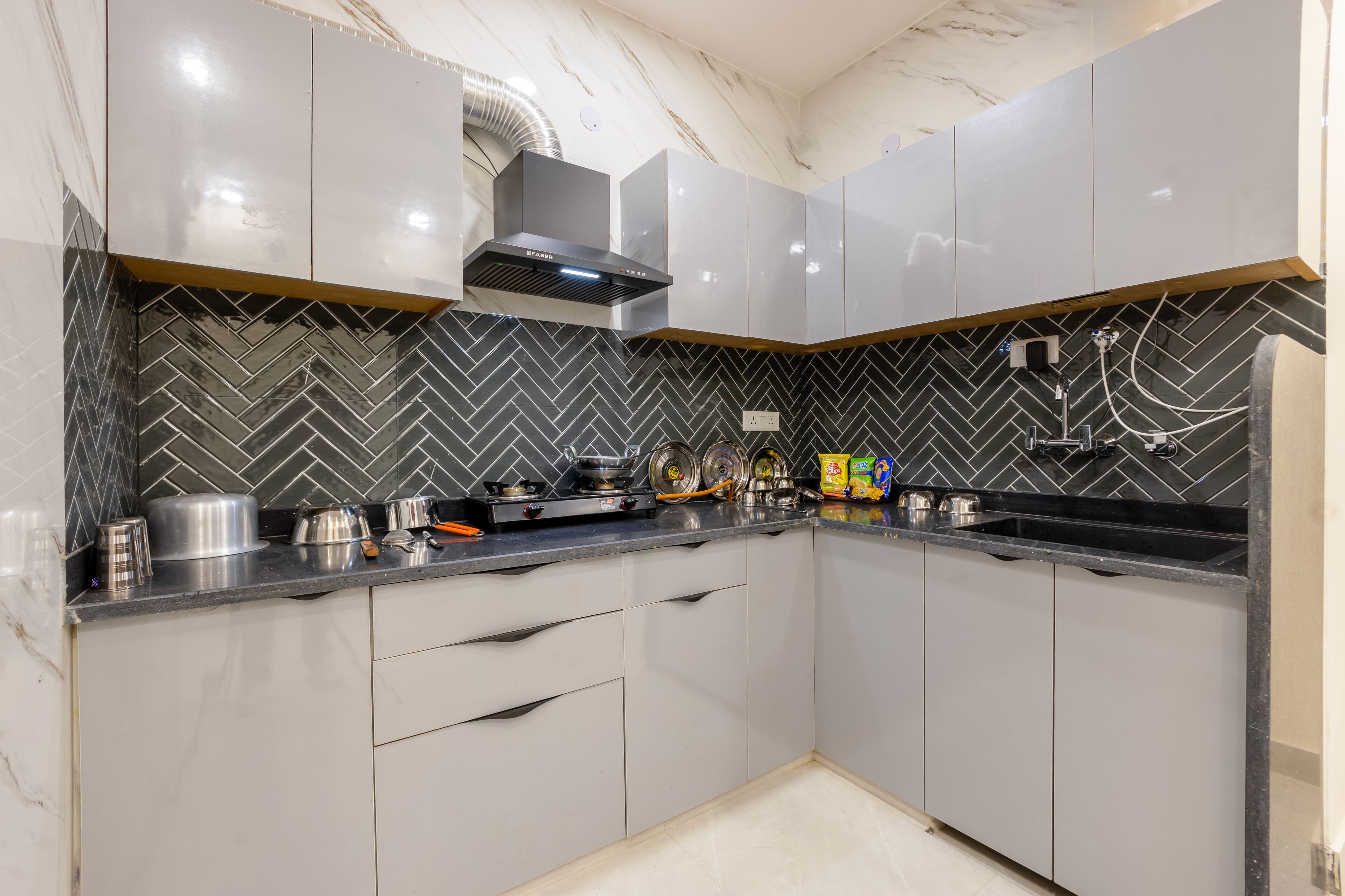 Fridge, coffee/tea maker, electric kettle, cookware/dishes/utensils