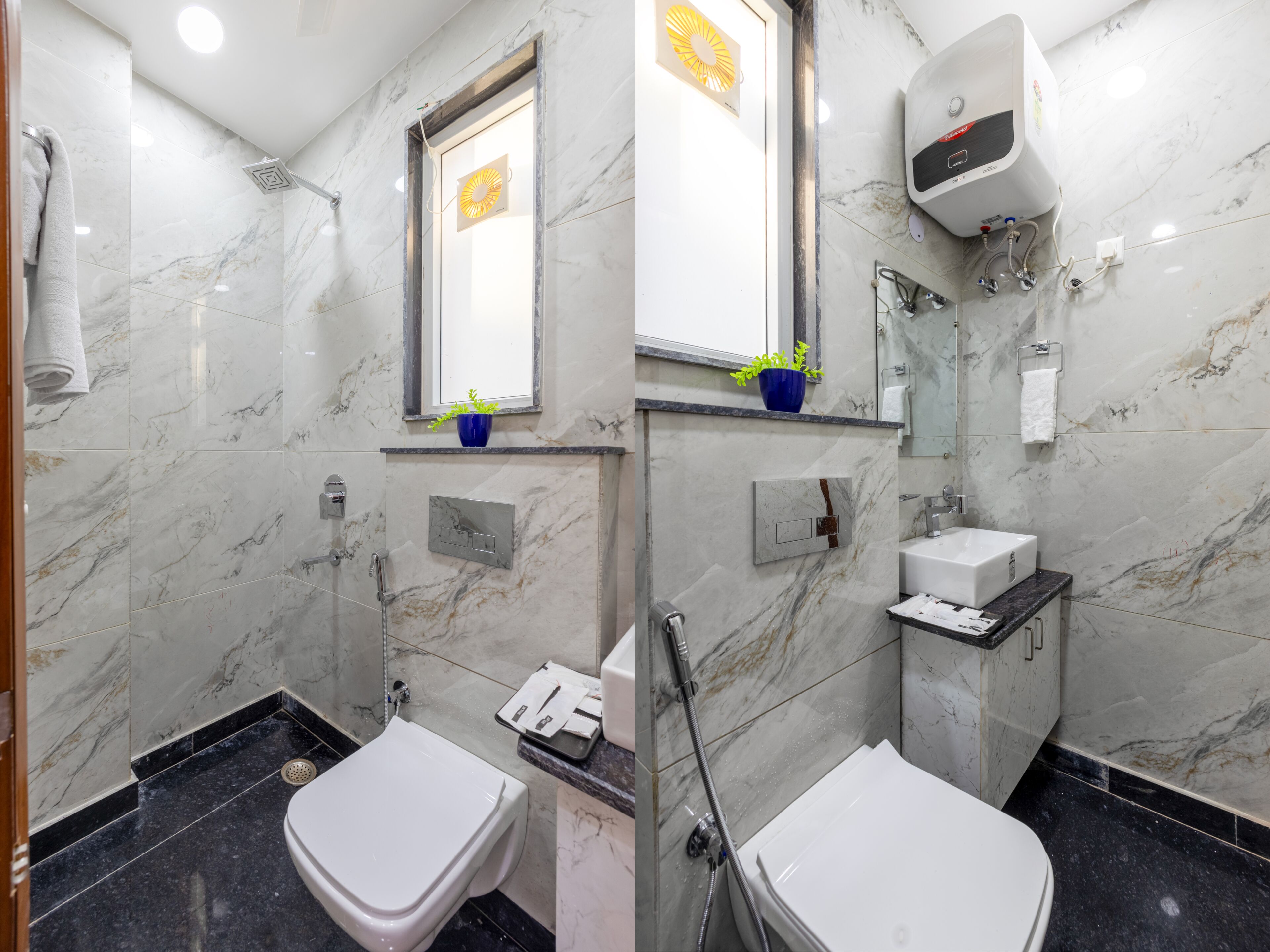 Ein Badezimmer mit Toilette, Dusche, Waschbecken und einer Topfpflanze.