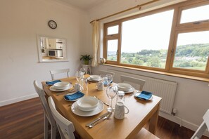 Dining - A spacious 5-bedroom countryside retreat with sweeping views across the valleys. (Ruscombe)