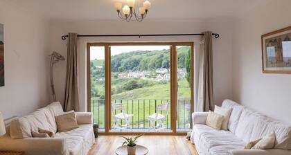 A spacious 5-bedroom countryside retreat with sweeping views across the valleys.
