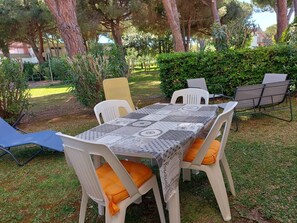 Outdoor dining - 'Prestige Apartment' with Shared Pool and Private Garden (Marina di Bibbona)