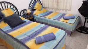 2 habitaciones, tabla de planchar con plancha, wifi y ropa de cama 