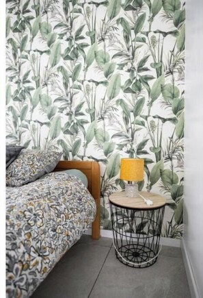 1 habitación, tabla de planchar con plancha, wifi y ropa de cama 