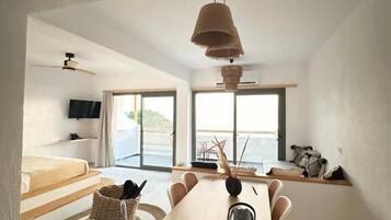 Deluxe Triple Room, Balcony, Sea View | In-room safe, desk, laptop workspace, blackout curtains
