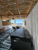 Deluxe Suite, Patio, Sea View | Property grounds