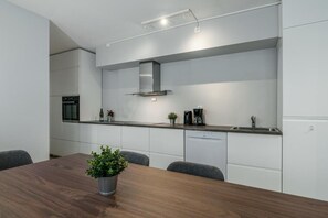 Family Apartment | Private kitchen | Fridge, oven, stovetop, dishwasher