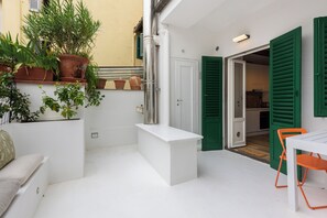 Apartamento conforto | Opções para refeição ao ar livre